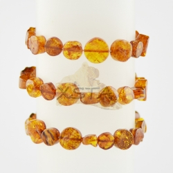 Amber bracelet with cognac color beads